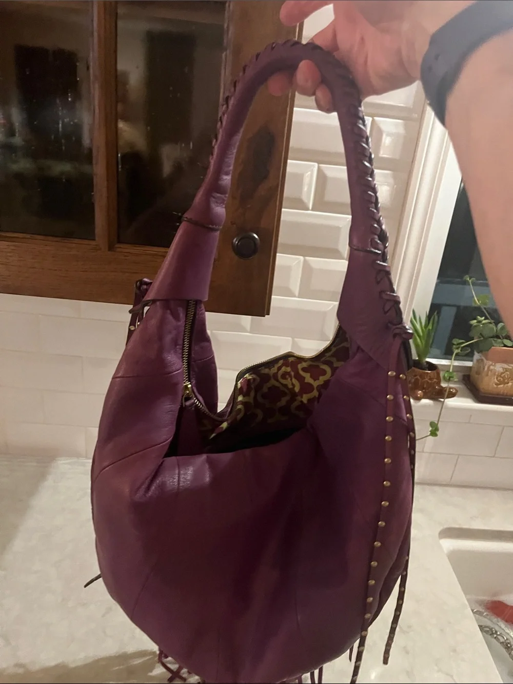 orYANY purple Studded  fringed Leather Hobo Bag with geometric interior material